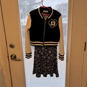 Black and White Varsity Jacket with Floral Dress
Wore once. Perfect condition